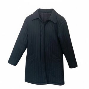 Cleo  petite deep black fall coat with tailored planket and clean, simple lines